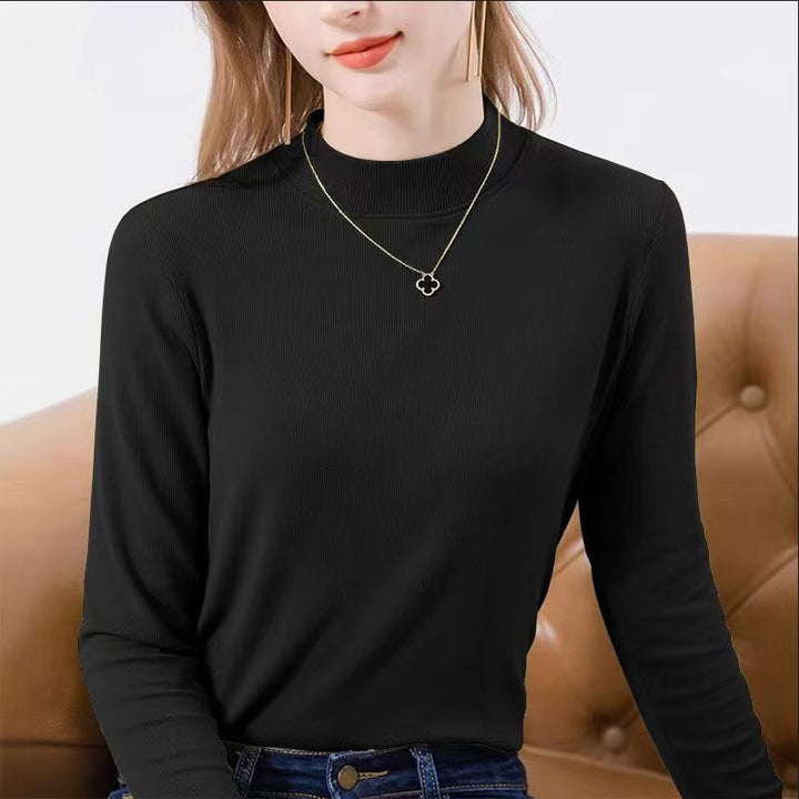 Women's long sleeve ribbed top with elegant stand-up collar and fitted cut
