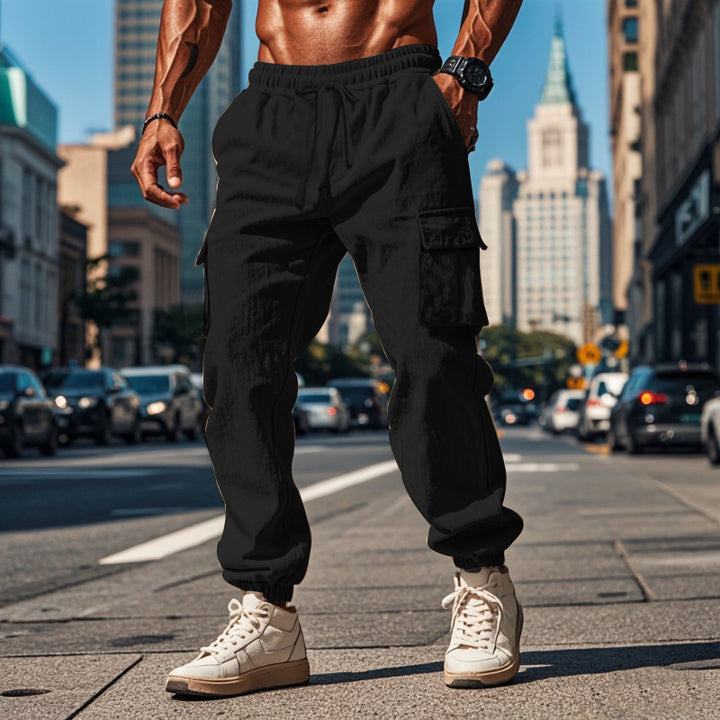 Men's cargo pants made of breathable linen blend with elastic waistband and practical side pockets Lisslune