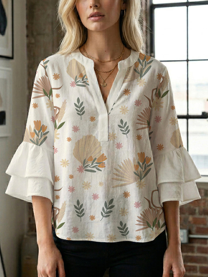 Women's blouse with ruffle details and eye-catching animal print Lisslune