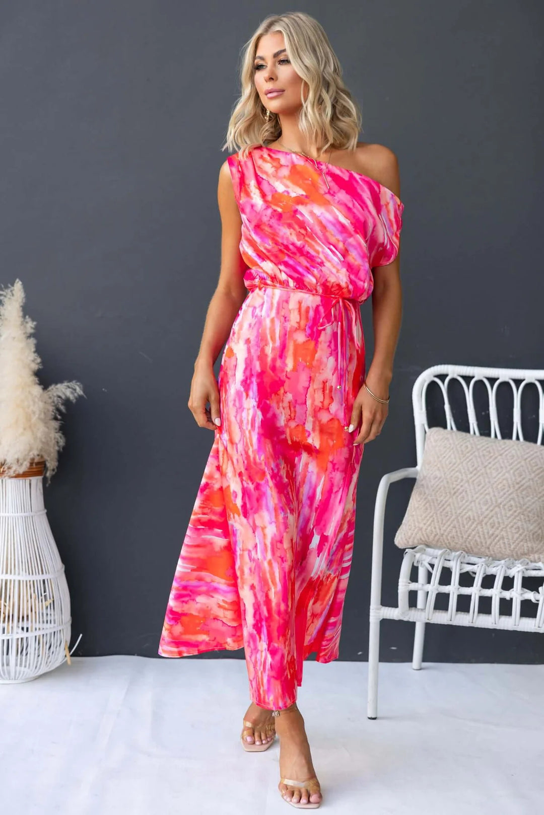 Women's maxi dress with asymmetrical design and flowing fabric