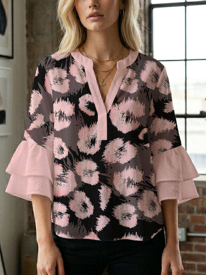 Women's blouse with ruffle details and eye-catching animal print Lisslune