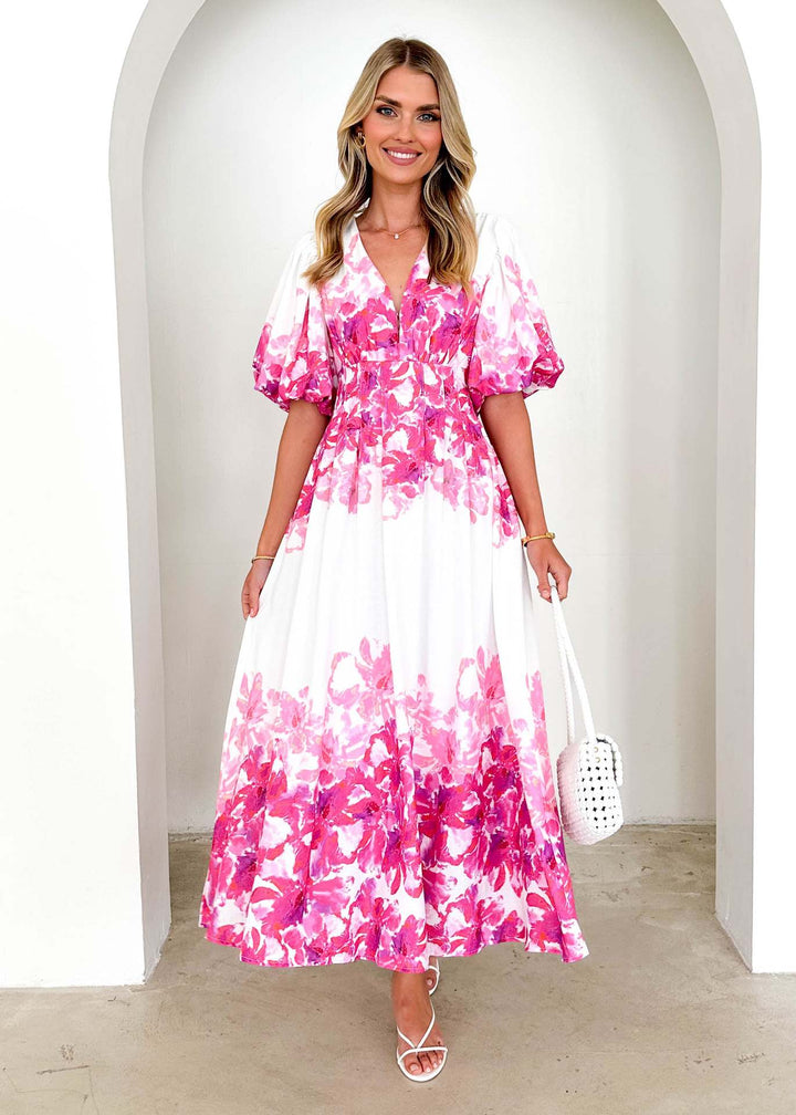 Women's maxi dress with voluminous puff sleeves and flowing cut