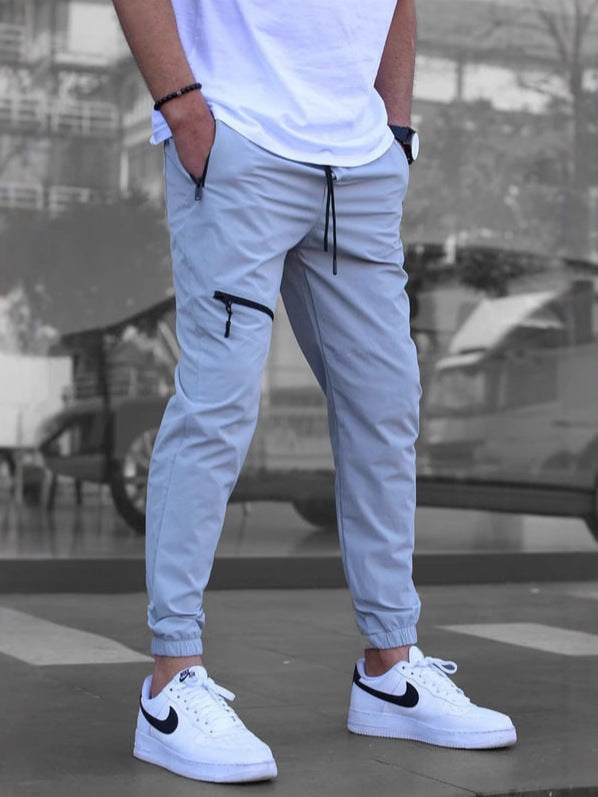 Men's sporty jogging pants with practical zip pockets and elastic waistband Lisslune