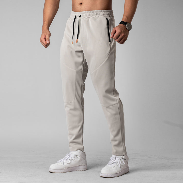 Men's sporty jogging pants with innovative breathable structure and practical zip pockets Lisslune