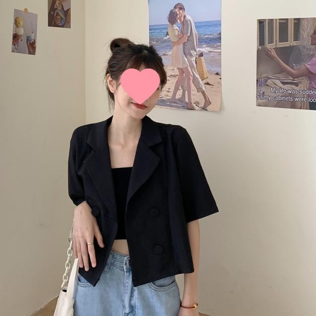 Women's short blazer with double button placket and fashionable cut