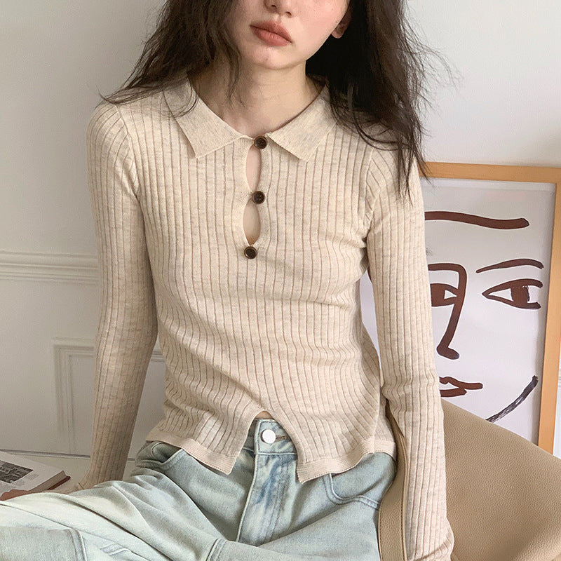 Women’s fine ribbed top with decorative button placket and side slit