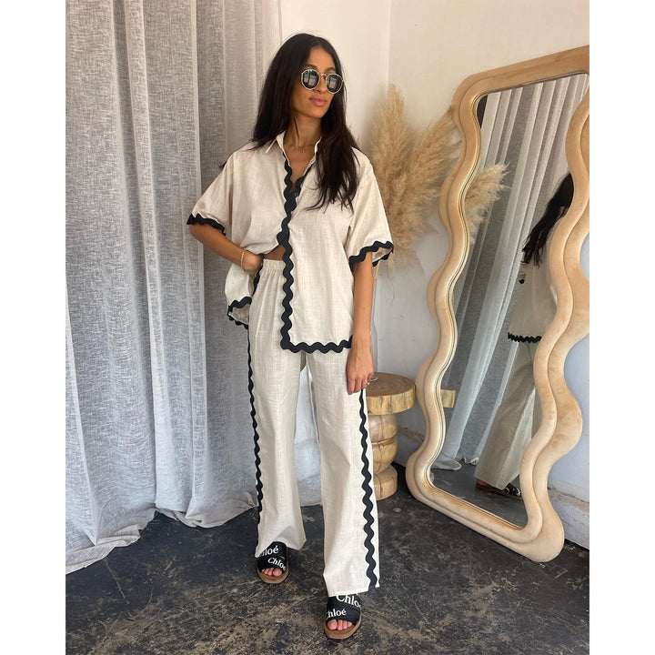 Women's two-piece set with fresh linen fabric and decorative wavy hem