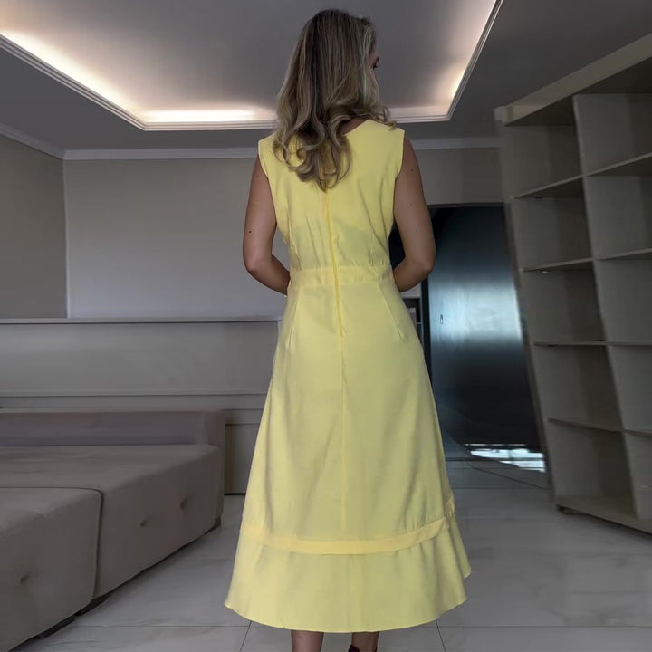 Women's midi dress with a flattering cut and practical pockets