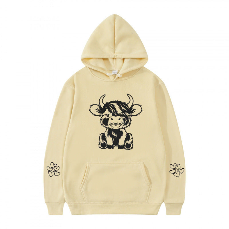 Women's hooded sweatshirt with charming cow motif and practical kangaroo pockets Lisslune