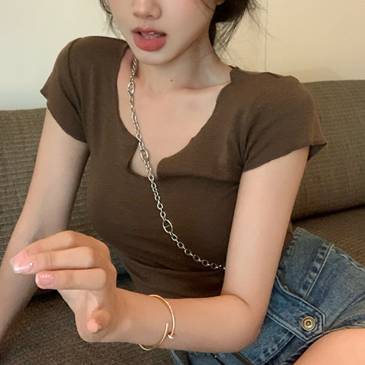 Women's short sleeve top with unique V-neckline and modern design