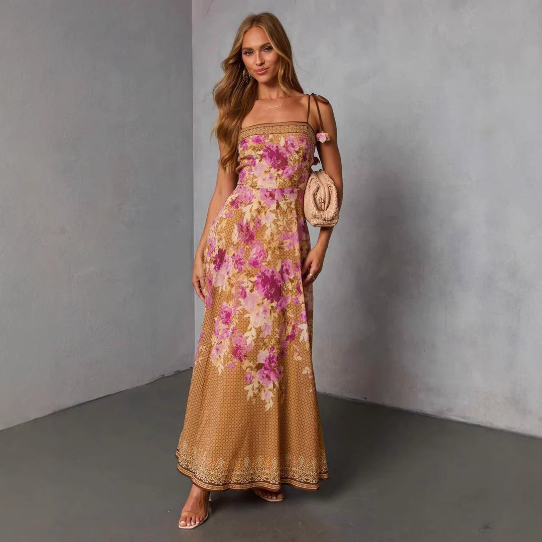 Women's maxi dress in romantic Bohemian style with floral accents and adjustable straps