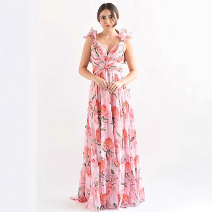 Women's maxi dress in romantic vintage style with a flowing skirt and ruffle details