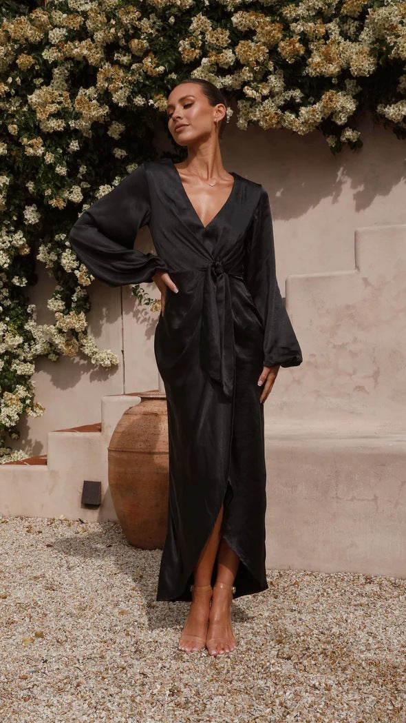 Women's satin wrap dress with elegant V-neckline and voluminous sleeves