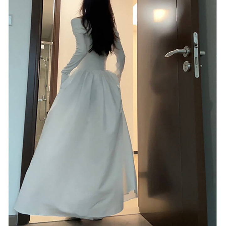 Women's elegant off-shoulder maxi dress with modern strap details Lisslune