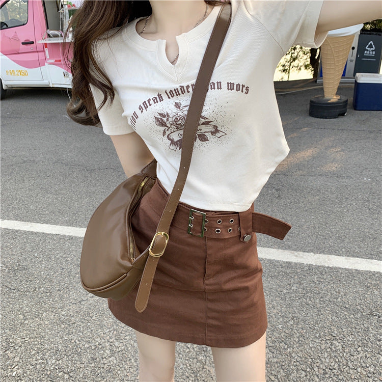 Women’s short sleeve shirt with elegant button design and creative graphic print