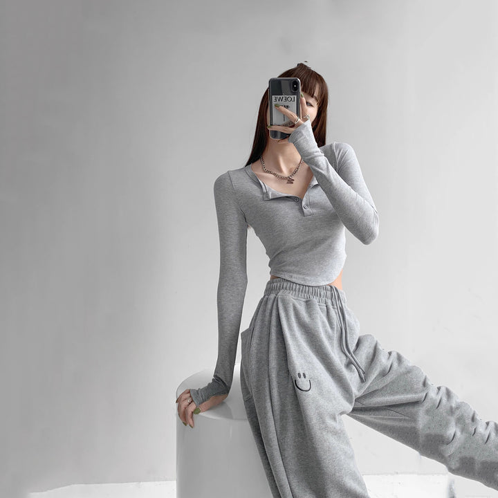 Women's long sleeve shirt with decorative button design and casual fit