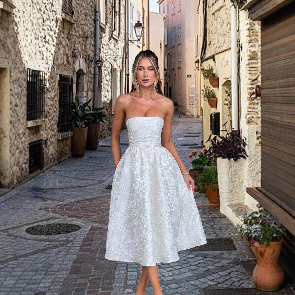 Ladies cocktail dress with elegant bustier top and flared skirt