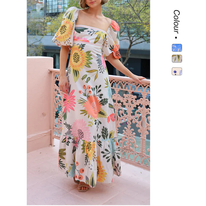 Ladies maxi dress with elegant puff sleeves and floral accents Lune London