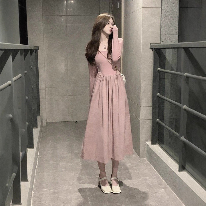 Women long-sleeved midi dress with flared skirt and decorative puff sleeves