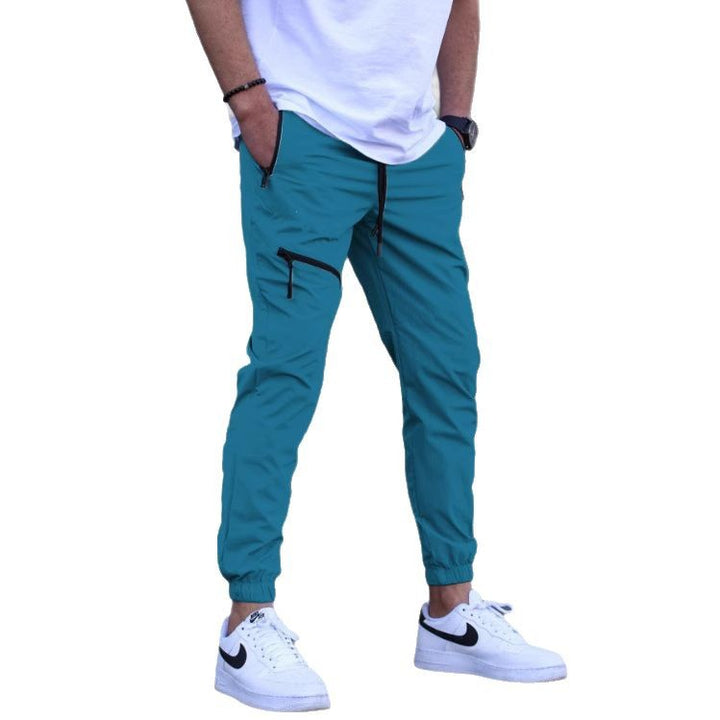 Men's sporty suit pants with elastic waistband and side zip pockets Lisslune
