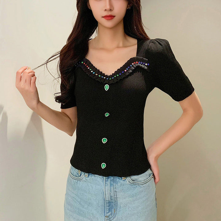 Women's fitted top with decorative button placket and fashionable V-neck