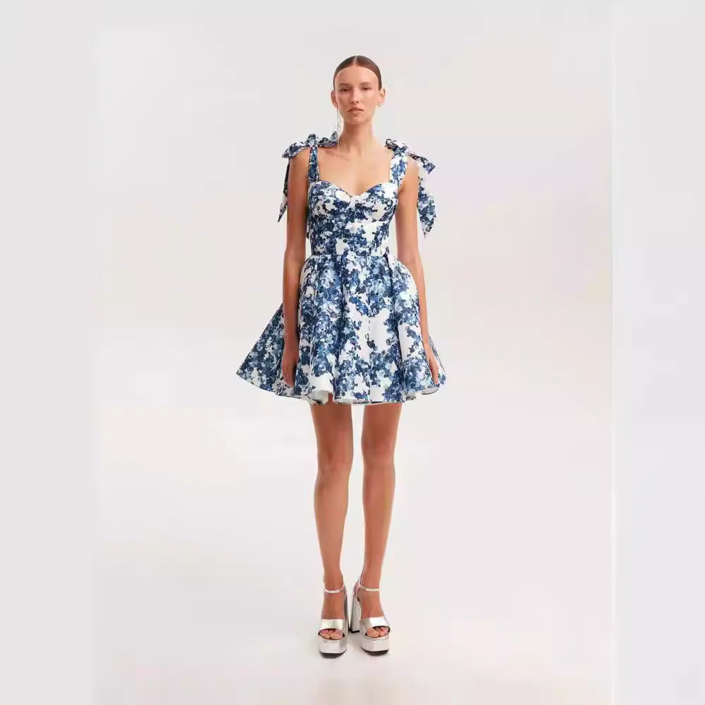 Women's Playful Mini Dress with Floral Design and Sophisticated Straps