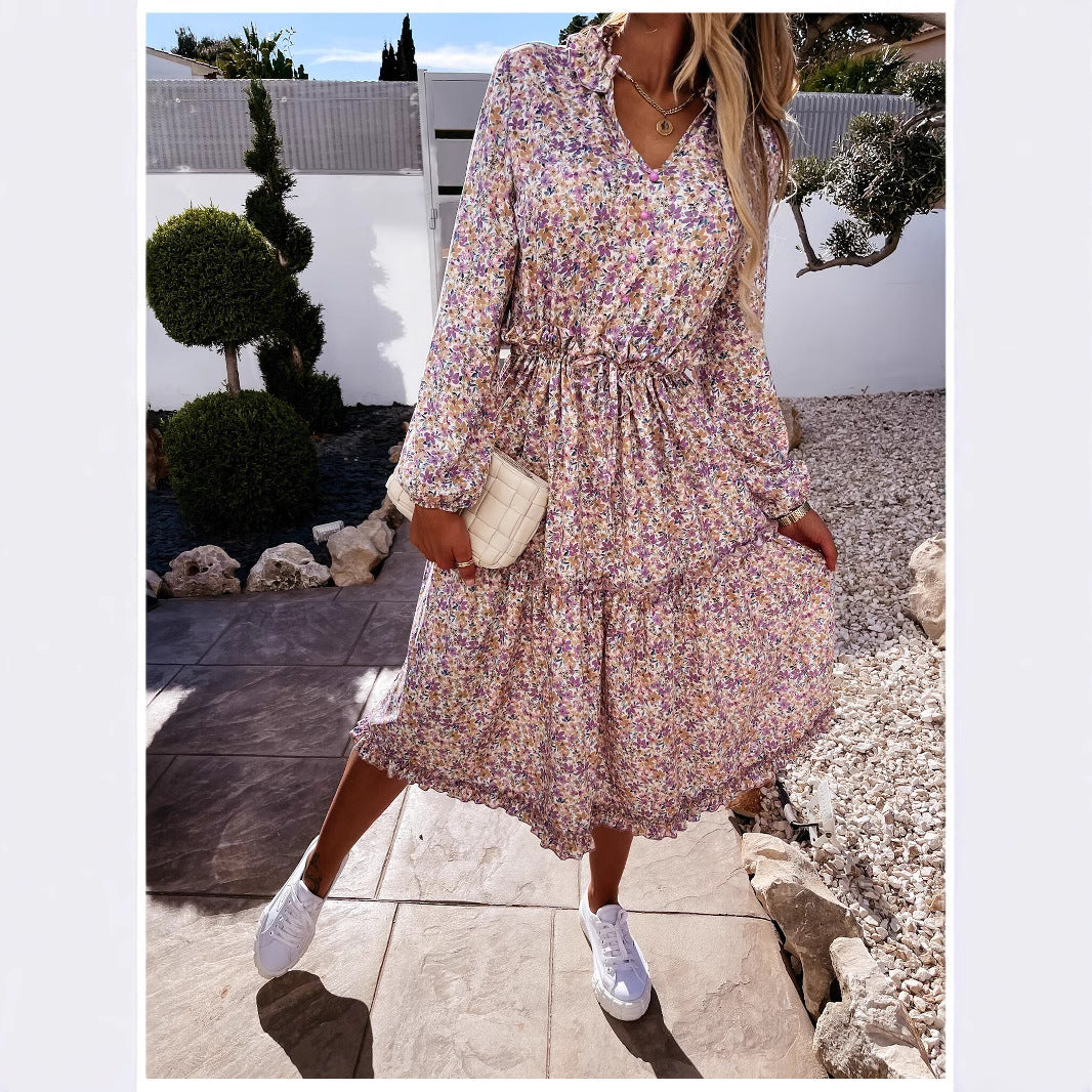 Women's floral dress with playful ruffle details and knee-length cut