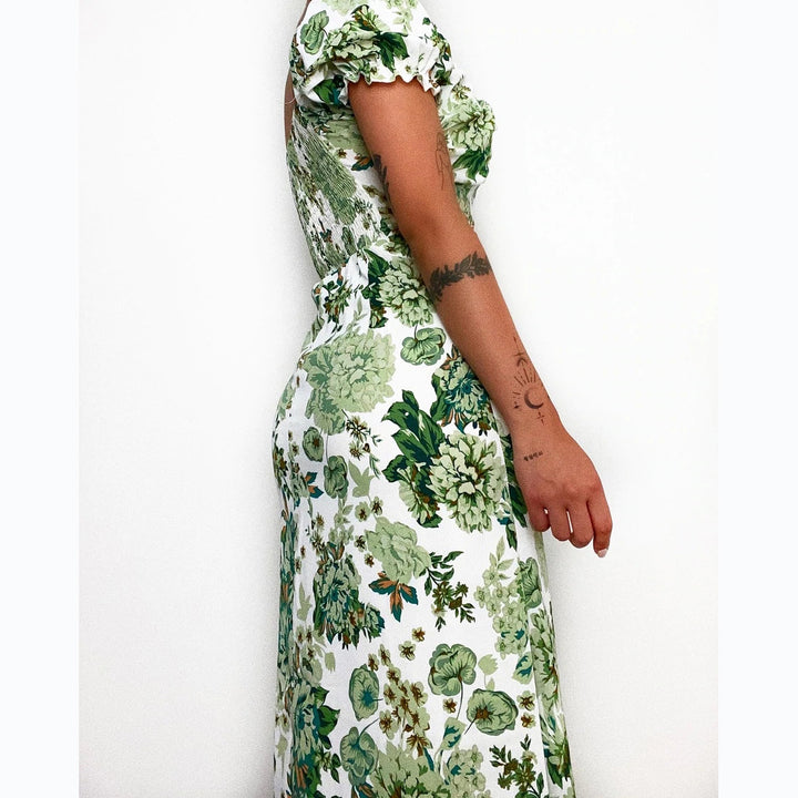 Women's floral pattern maxi dress with deep neckline and tailored fit Lune London