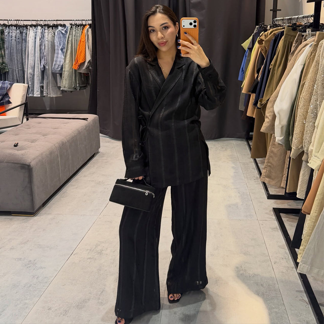 Women's set of stylish oversized blazer and wide-cut trousers
