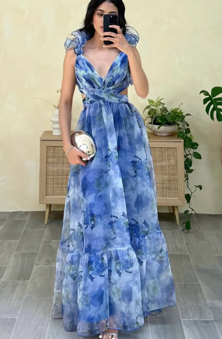 Women's maxi dress in romantic vintage style with a flowing skirt and ruffle details