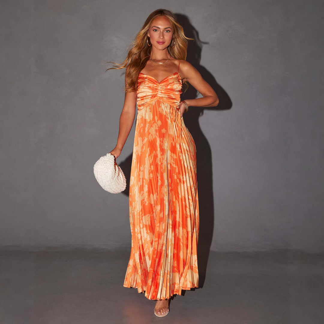 Women's maxi dress with fashionable pleats and elegant floral design
