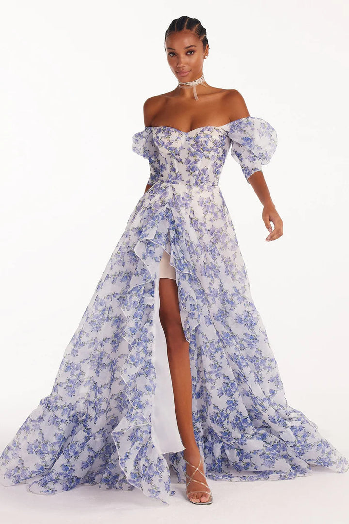 Women's festive maxi dress with off-shoulder design and floral ruffle details
