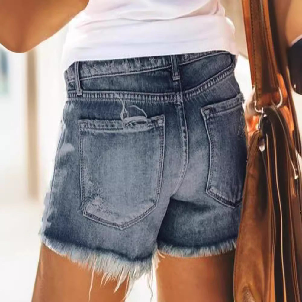 Ladies Destroyed Denim Shorts in a modern look with fringes Lisslune