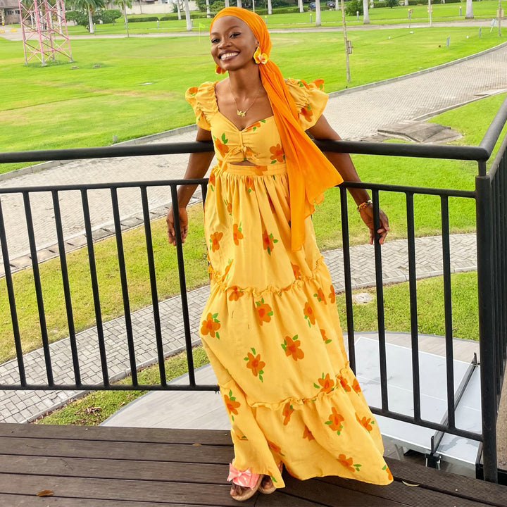 Women's maxi dress with voluminous ruffles and floral accents Lisslune