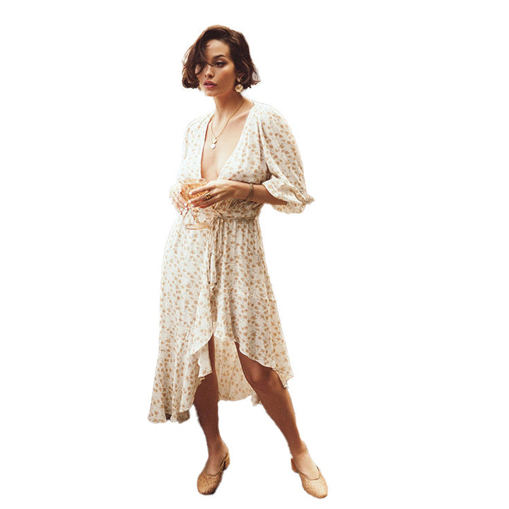 Women's maxi dress with deep V-neckline and playful floral print