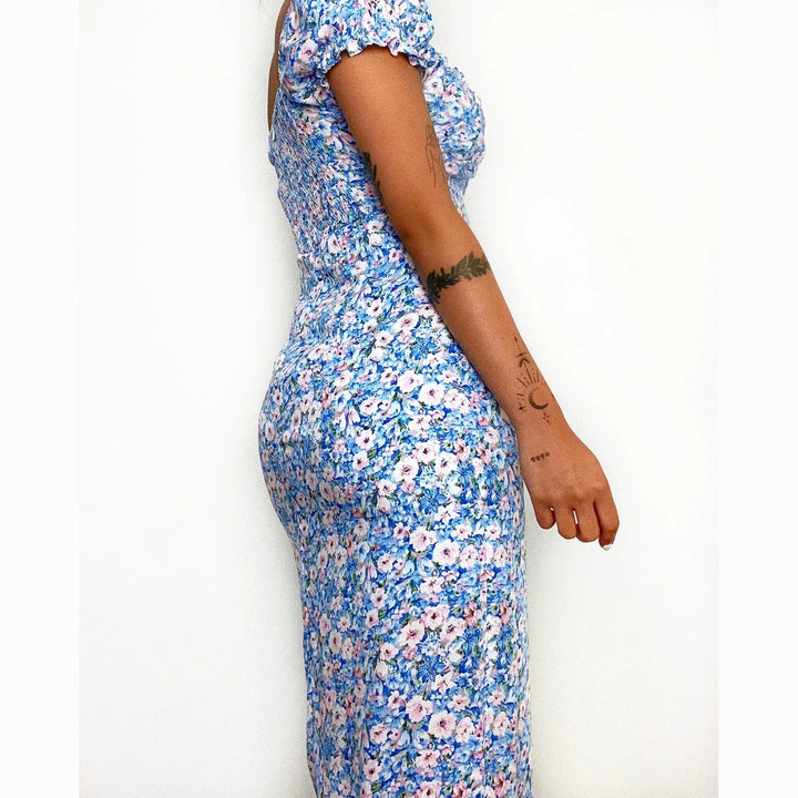 Women's floral pattern maxi dress with deep neckline and tailored fit Lune London
