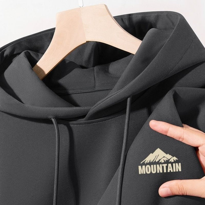 Women's hoodie with modern mountain motif and practical pockets Lisslune