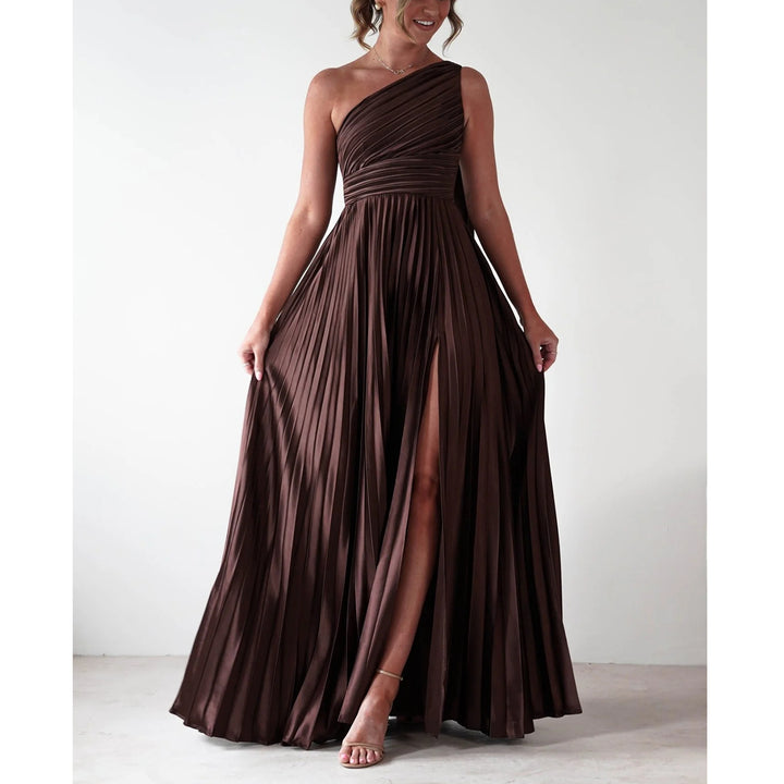 Ladies evening dress with elegant pleated skirt and asymmetric top