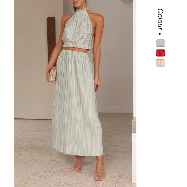 Women's maxi dress with expressive pleated skirt and stylish halter neck Lune London