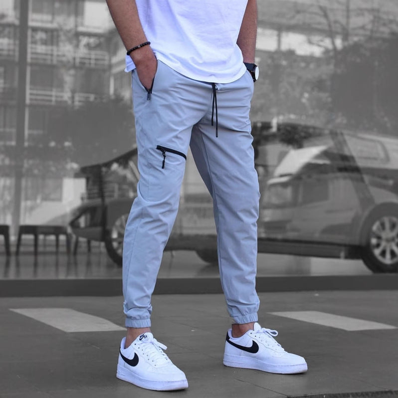 Men's sporty suit pants with elastic waistband and side zip pockets Lisslune