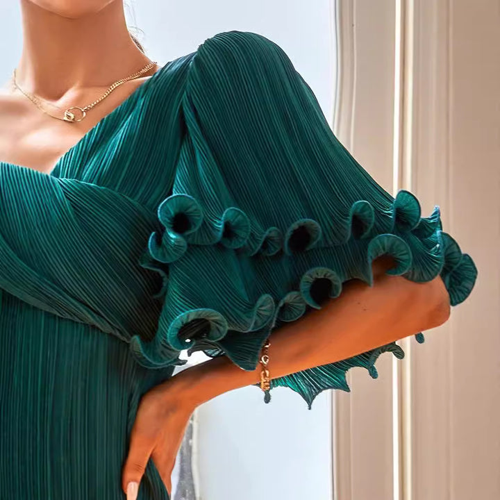 Women’s pleated dress with voluminous ruffle sleeves