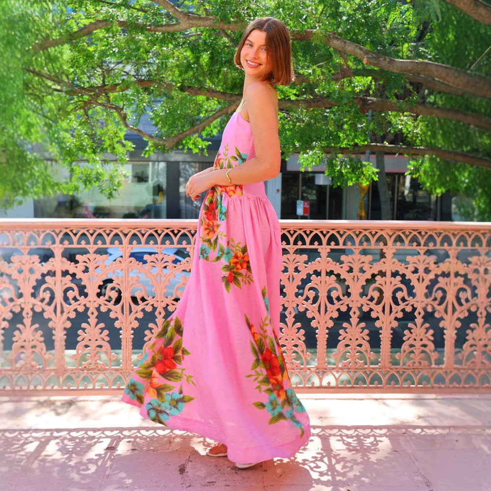 Women's maxi dress with floral draping design and ankle-bared straps