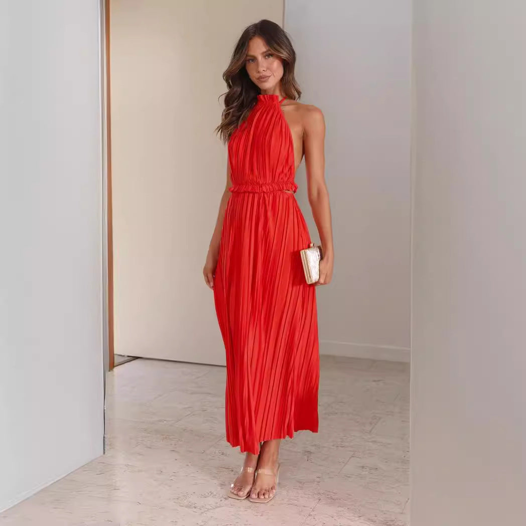Women's maxi dress with expressive pleated skirt and stylish halter neck Lune London