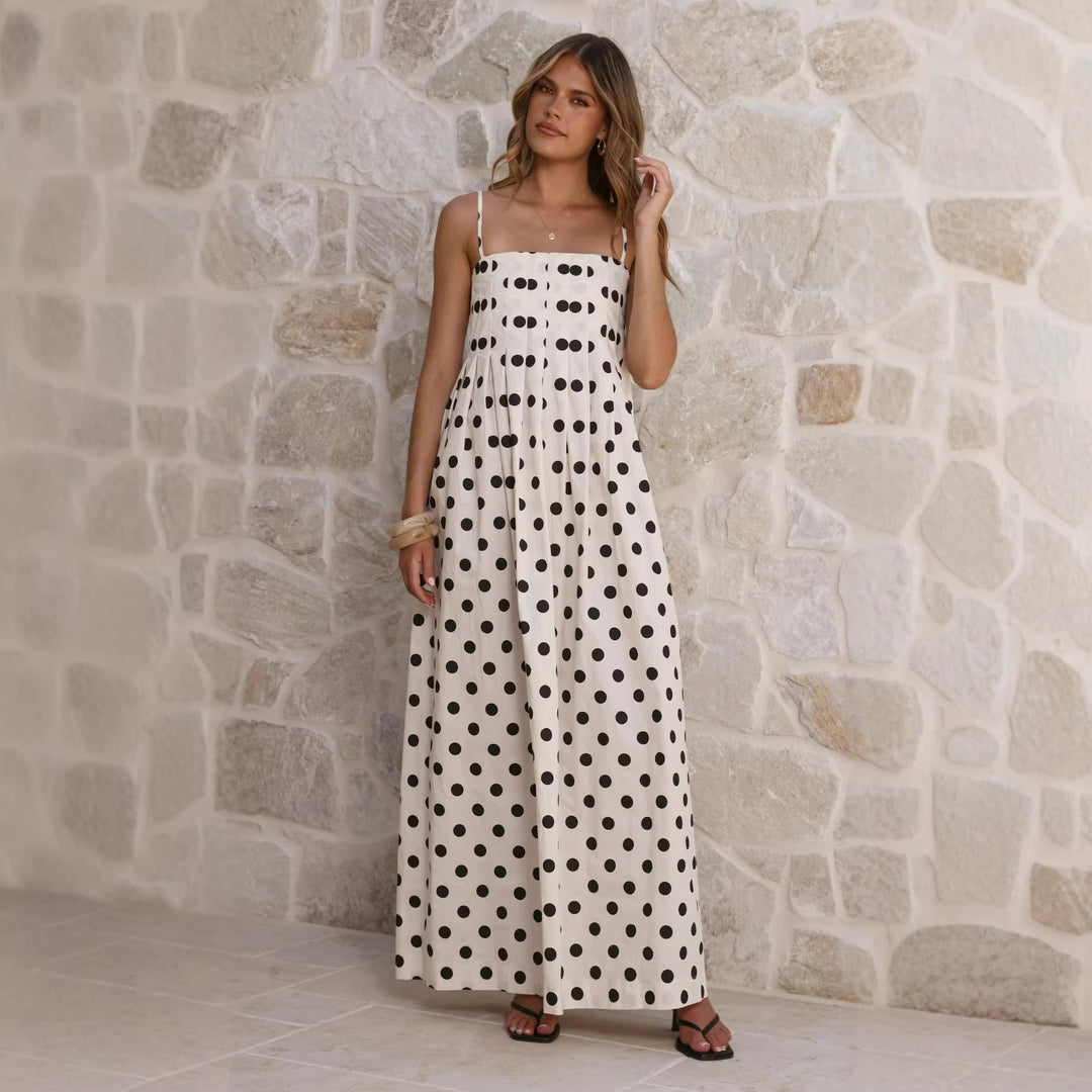 Women’s maxi dress with playful polka dot pattern and off-the-shoulder straps