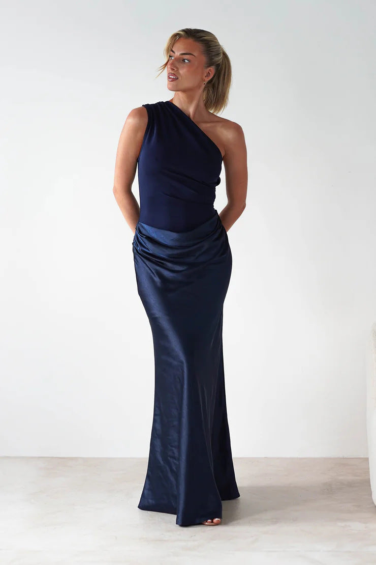 Women’s evening dress with asymmetrical cut and elegant draping design