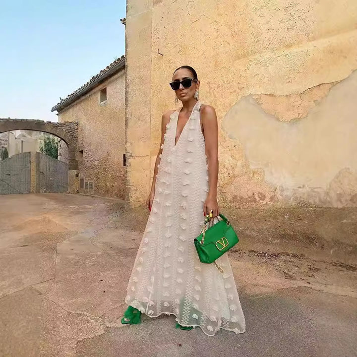 Women's maxi dress with 3D textures and deep V-neck