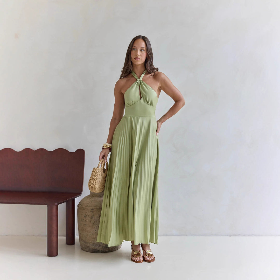 Women's maxi dress with elegant halter design and pleated skirt