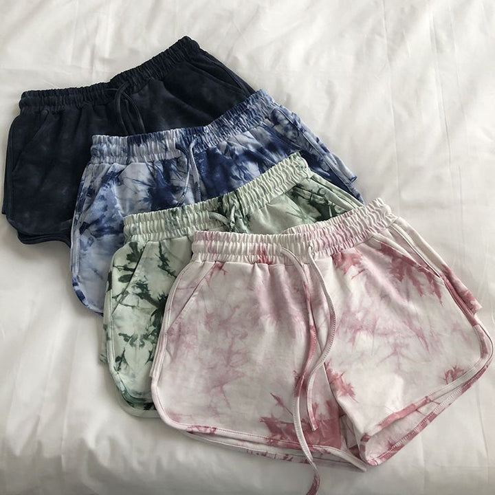 Women’s casual sweat shorts with trendy tie-dye design and practical side pockets