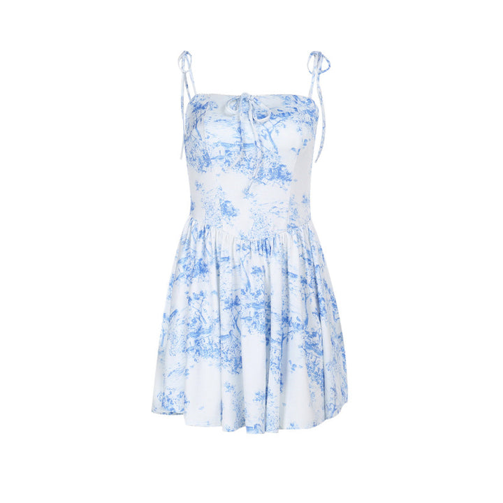 Women's playful midi dress with spaghetti straps and floral motifs Lune London