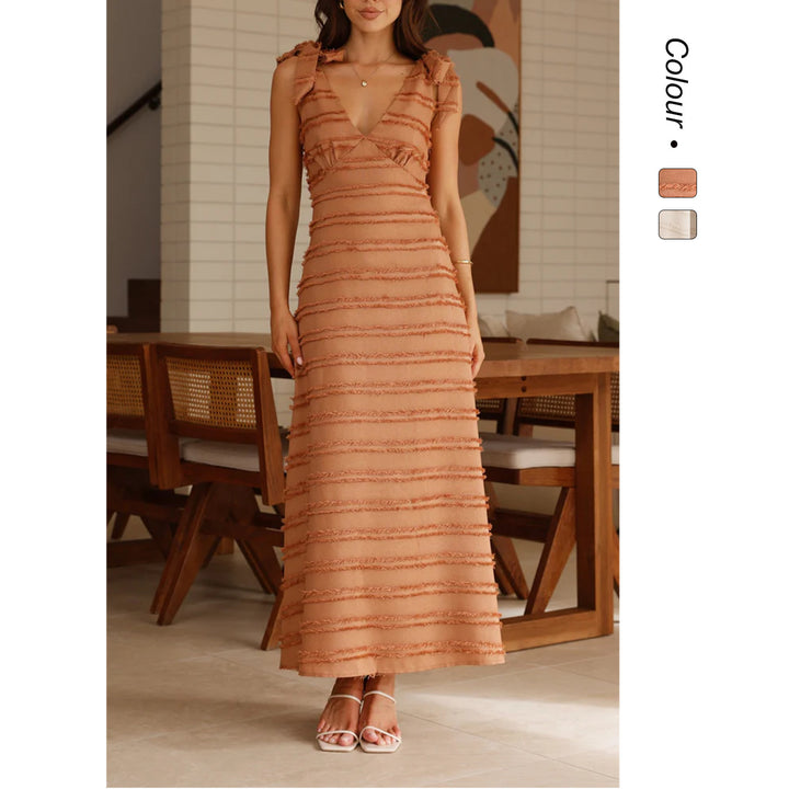 Ladies maxi dress with elegant draping design and ruffle accents